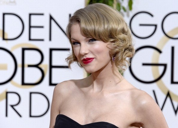 Taylor Swift at 71st Annual Golden Globe Awards — photo 26